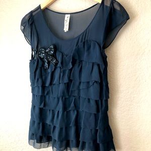 Navy ruffled blouse by Floreat
